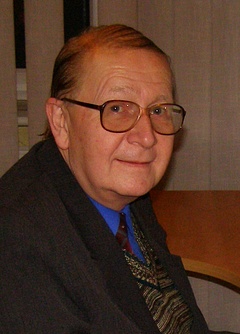 A. Komraus